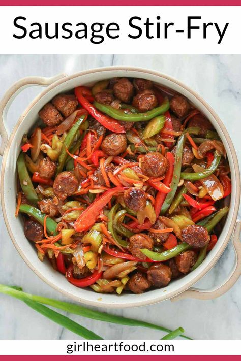 If you're looking for an easy, satisfying supper that's perfect for busy weeknights, then give this yummy sausage stir-fry recipe a try! It's loaded with flavourful sausage, colourful veggies and a simple stir-fry sauce. #stirfryrecipe #stirfrywithsausage #sausagestirfry Keto Sausage Stir Fry, Sausage Veggie Stir Fry, Chicken Sausage Stir Fry Recipe, Bratwurst Stir Fry, Teriyaki Sausage Stir Fry, Sausage And Veggies Stirfry, Sausage Stir Fry Sauce, Stir Fry Sausage And Veggies, Turkey Sausage Stir Fry