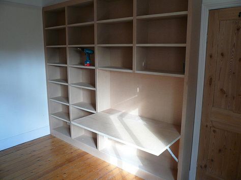 shelves with fold out desk 1 by Peter Murphy Carpentry, via Flickr Built In With Fold Out Desk, Bookshelf With Fold Out Desk, Bookshelf With Pull Out Desk, Bookshelves With Hidden Desk, Diy Bookshelf Desk Combo, Fold Out Desk Bookshelf, Fold Down Desk With Storage, Homeschool Desk, Fold Up Desk