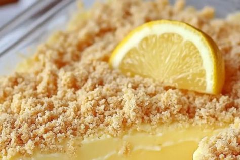 Make these frozen lemon dessert bars with a zesty lemon filling & buttery crust. Perfect summer treat that’s easy to make & delicious Frozen Lemon Dessert, Lemon Desserts Bars, Frozen Lemon, Lemon Dessert, Dessert Bar Recipe, Lemon Filling, Lemon Desserts, Graham Cracker Crumbs, Summer Treats