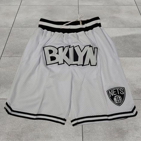 Show off your Brooklyn pride with this retro Nets-inspired basketball shorts! Made from breathable sports mesh, this unisex athletic shorts offer comfort and style for every game or casual wear. *Features* *Retro Brooklyn Nets-inspired design *Made with breathable sports mesh for maximum comfort *Elastic waistband with adjustable drawstring *Unisex fit, suitable for both men and women *Perfect for sports, casual wear, or lounging *Durable stitching for long-lasting wear *Materials* *100% breathable polyester mesh *Soft, lightweight fabric for comfort and mobility *Durable stitching and high-quality print design *Sizes (Inches)* *XS, S, M, L, XL, 2XL *Weight* *Approx. 1 lbs (weight may vary slightly by size) *Guarantee* *We are confident that our shorts are designed and crafted with the hig White Basketball Shorts, Nba Shorts, Basketball Pants, White Basketball, Brooklyn Nets, New York Knicks, Basketball Shorts, Sport Man, Sport Pants