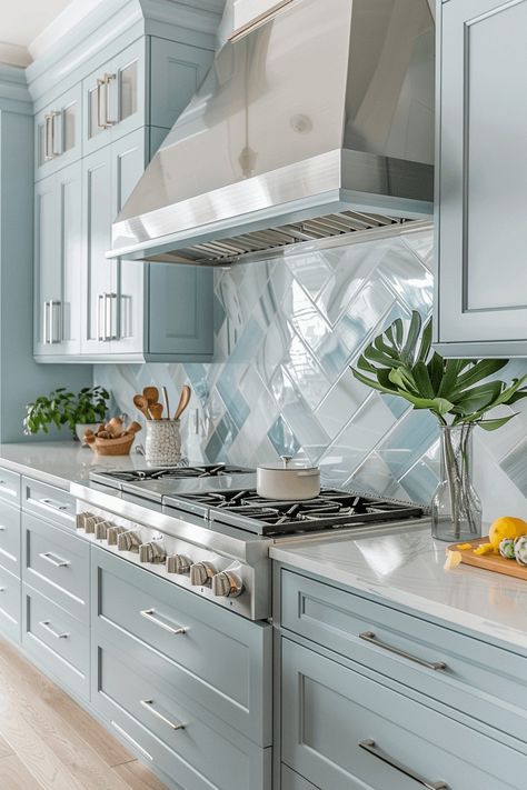 beach kitchen with glass backsplash Coastal Kitchen Grey Cabinets, Coastal Home Kitchen Ideas, Beachy Backsplash Kitchen, Beach Backsplash Kitchen, Beach Houses Interiors, Florida Kitchen Remodel, Beachy Backsplash, Coastal Kitchen Backsplash, Blue Tile Backsplash Kitchen