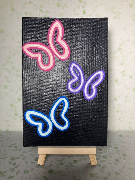 3 butterfly painting with acrylic canvas on a6 x 4 in. Canvas board. Ideas For A Black Canvas, Stuff To Paint On A Black Canvas, Split Canvas Painting Ideas Easy, Half Butterfly Painting On Canvas, Aesthetic Simple Painting Ideas, Big Canvas Painting Ideas Acrylic Easy, Easy Cat Paintings For Beginners, 8x10 Painting Canvas Ideas, Canvas Painting Ideas For Mom