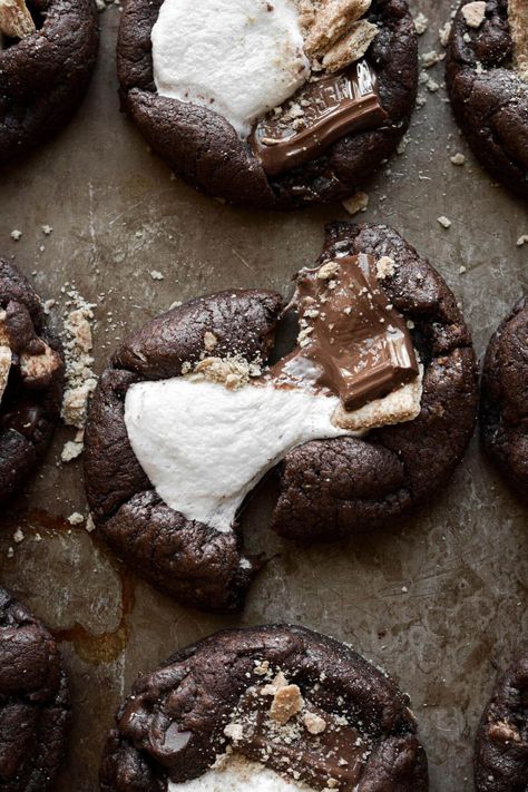 Thick and chewy s'mores cookies, made with double chocolate cookies loaded with crushed graham crackers and chocolate chips, and a gooey marshmallow center.  This is a quick and easy, high altitude cookie recipe, with no chill time and no mixer required! S’mores Stuffed Cookie, Summertime Desserts, Marshmallow Smores, S Mores Cookies, High Altitude Baking, Marshmallow Cookies, Smores Cookies, Double Chocolate Chip Cookies, Double Chocolate Cookies