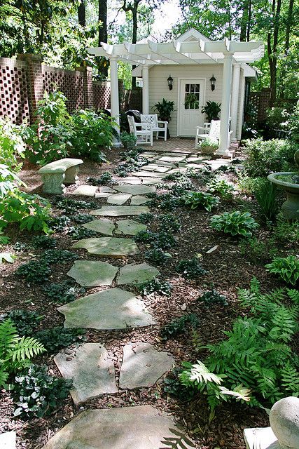 Guest cottage or retreat. So cute! I know someone who built a small "guest house" in his backyard for his grandson so they'd have somewhere to camp out when he came over. Love the idea Garden Flagstone, White Shed, Cottage Landscaping, Fair Garden, Treehouse Ideas, Window Greenhouse, Flagstone Path, Paving Ideas, Backyard Dreams