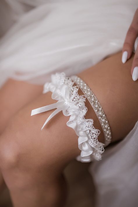 Handmade bridal garters set of two: 1. Bridal garter of crystal beaded embroidery and pearls (ca. 1 cm width) 2. Wedding garter made of delicate Italian lace with a satin bow (ca. 4 cm width) One can buy them separately. Please, check the right choice. Elevate your bridal ensemble with our enchanting crystal bridal garter set, a personalized touch to your wedding attire that exudes elegance and charm. 📏 Size Options: Refer to our size chart below to ensure the perfect fit: Medium (M): Circumfer Wedding Thigh Garter, Garter For Bride, Bridal Corset Undergarment, Western Wedding Garter, Boho Wedding Garter, Plum Wedding Colors, Wedding Garder, Garter Set Wedding, Thigh Garter