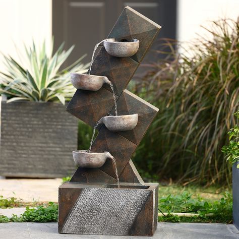 Fixed to an angular pillar, this lovely cascading fountain boasts four intricately designed bowls in a rustic metal finish. Water gently pours into each pool, providing a soothing sound that's enjoyable for outdoor areas. Outdoor Fountain Ideas, Mall Exterior, Backyard Waterfalls, Fountain Wall, Patio Fountain, Water Fountain Design, Indoor Water Features, Front Yard Decor, Backyard Patio Deck