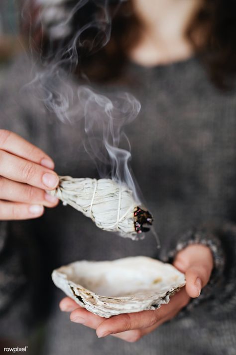 Woman burning sage smudge to cleanse the house | premium image by rawpixel.com / Karolina / Kaboompics Sage Bundles, Spiritual Photos, Burning Sage, Voodoo Spells, Black Magic Spells, White Sage Smudge, Sage Smudge, Removing Negative Energy, Branding Shoot