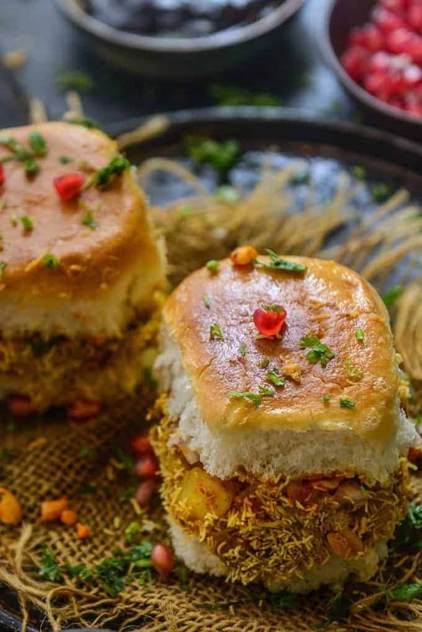 Kutchi Dabeli is a popular Indian Street Food and it's basically pav stuffed with a tangy and spicy potato masala and chutneys. Here is how to make Dabeli Recipe at home. #Dabeli #KutchiDabeli #Gujarati #Indian #Snack #StreetFood Dabeli Recipe, Desi Street Food, Tamarind Chutney, Dry Coconut, Indian Street Food, Evening Snacks, Chutney Recipes, Food Cravings, My World