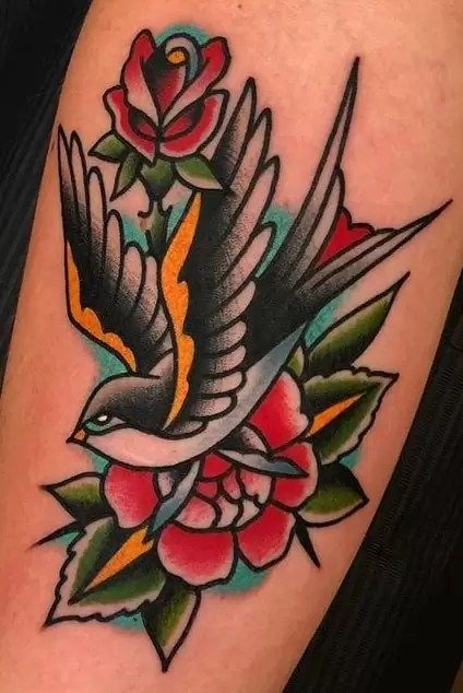 American Traditional Tattoos: History, Meanings, Artists & Designs Traditional Swallow Tattoo, Traditional Lighthouse Tattoo, American Traditional Sleeve, Tato Tradisional, Traditional Tattoo Inspiration, Sparrow Tattoo, Traditional Style Tattoo, Tattoo Old School, Swallow Tattoo