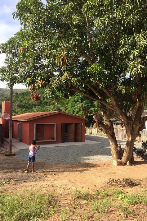 Small House in Brazil Transformed into Headquarters of Coconut Producers Co-Op Brazil Houses, Extension Designs, Wooden Shutters, Commercial Buildings, Rainwater Harvesting, Mini Clubman, Adaptive Reuse, Rain Water Collection, Eco Friendly Design