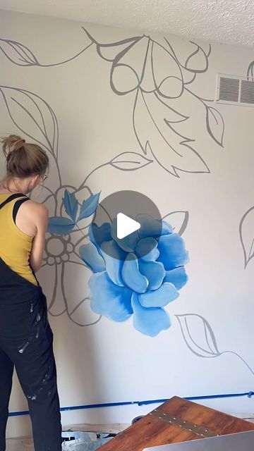 Megan Jefferson Art on Instagram: "I loved painting these layers of flowers! This bedroom is so dreamy!  #painting #mural #bedroomdesign #paintedflowers #paintedwall #interiors #paintedwalls #paintedwallpaper #blue #flowers" Large Painted Flowers On Wall, Floral Wall Painting Ideas Hand, Acrylic Paint On Walls Bedroom, Easy Flower Painting On Wall, Easy Wall Murals Painted Diy Art Ideas, Flower Wall Murals Painted Diy, Hand Painted Flowers On Wall, Painted Murals On Walls, Floral Wall Mural Painting