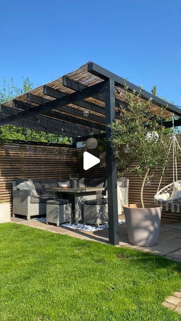 Sarah | Interiors & DIY on Instagram: "DIY pergola

It’s almost 3 years since we made our own pergola. Unable to find a kit to fit the corner as we wanted, we headed off to our local timber yard, put pen to paper and created a simple structure. We then painted it black and added some reed-on-a-roll to create shade, with corrugated plastic over the top to make the area waterproof. Now we are able to enjoy the space throughout the summer months, regardless of the weather 🖤

Pergola is painted in Off-Black exterior eggshell by @farrowandball (previously declared gift)

#projectgarden #gardenproject #gardenideas #gardeninspo #gardendesign #gardendiy #diypergola #gardenpergola #pergola #gardenrenovation #patiofurniture #patioinspro #gardenpatio #southfacinggarden #gardening #gardenplants #love Small Urban Garden Design, Small Urban Garden, Urban Garden Design, Balkon Design, Pergola Ideas, Pergola Design, Diy Pergola, Small Backyard Patio, Pergola Designs