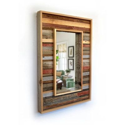 One-of-a-kind 24" x 36" reclaimed wood mirror, handcrafted from rustic reclaimed barn siding in a unique striped pattern. This mirror would be right at home in any rustic setting, living room, kitchen, bathroom, office, etc. The total size of the mirror is 24" x 36", and the mirror glass itself is approximately 14" x 20". | Millwood Pines Avello Mirror Brown 36.0 x 24.0 x 2.5 in | Home Decor | C100543155 | Wayfair Canada Barn Wood Mirror, Reclaimed Wood Mirror, Lake House Bathroom, Custom Mirror, Barn Siding, Rustic Vanity, Wall Mirrors Set, Wood Framed Mirror, Custom Mirrors