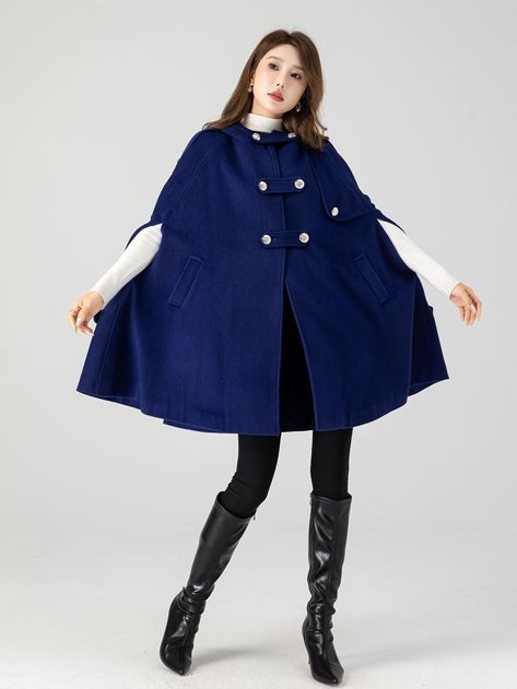 "This Wool cape is a gorgeous clothing with hood, design with hip pockets and large silver button details. This winter cape is made from soft wool fabric,the blue wool cape is completely lined in polyester with fabulous flap detailing on the front, shoulders, pockets and back. This is a womens hooded cape you will wear forever. The stylish design will gives a retro feeling and keep you warm in winter days.put it on, you will be the focus of everyone's attention. Detail * The coat is the perfect Julie Core, Felix Fashion, Wool Cloak, Winter Cape, Wool Cape Coat, Hood Design, Blue Cape, Coat Plus Size, Shoulder Cape