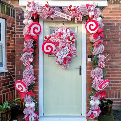 CHRISTMAS IS OFFICIALLY OPEN BE THE FIRST TO GRAB YOUR CHRISTMAS GARLANDS, AND SECURE YOUR PLACE. IF YOU ARE LOOKING FOR A DOOR GARLAND IN A DIFFERENT THEME OR STYLE PLEASE MESSAGE THE PAGE https://www.stassisbespokecreations.co.uk/store/prod_8093778-18ft-Candy-Cane-Front-door-Christmas-Garland.html#productBasket Christmas Door Garland, Candy Cane Garland, Front Door Garland, Outdoor Christmas Garland, Large Front Door, Giant Candy Cane, Door Garland, Garland Wreath, Wedding Flower Packages