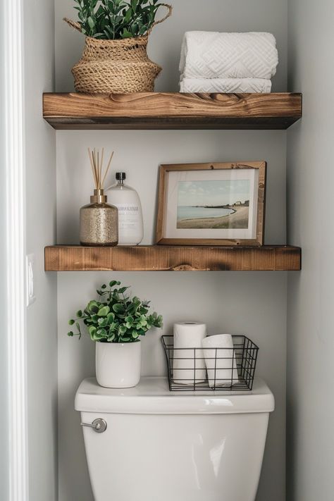 bathroom shelf ideas over the toilet Toilet Sink Decor, Floating Shelves In Half Bathroom, Over The Toilet Wall Decor, Decor For Toilet Room, Over Bath Shelf, Decoration Small Bathroom, Toilet Room Shelf Decor, Floating Toilet Shelf, Cozy Toilet Ideas