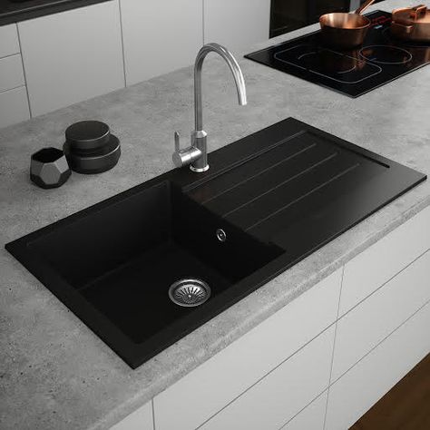 We’re all keen to do our best for the environment when it comes to buying things for our home, but that doesn’t mean we need to sacrifice performance or style. Sauber is leading the way with their eco-friendly, composite kitchen sinks to make sure we’re all reducing the footprint we leave whilst guaranteeing you a totally sublime and stylish place to wash hands or plates in your kitchen. FeaturesDurable, precision-made black compositeHeat and scratch-resistantAntibacterialEnvironmentally friendl Granite Composite Kitchen Sink, Composite Sinks, Copper Taps, Gold Taps, Black Kitchen Sink, Kitchen Sink Design, Granite Kitchen Sinks, Black Sink, Inset Sink