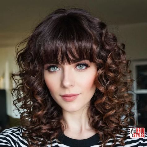 35. Curly Fringe Bangs | 60 Best Curly Hairstyles With Bangs For A Stunning Look! Welcome to the world of irresistible curls and chic bangs! If you're ready to embrace a bold and beautiful transformation, you've come to the right place. In this comprehensive guide, we'll navigate the exciting realm of curly hairstyles with bangs, showcasing the 60 best. Curly Haircuts With Bangs And Layers, Curly Cuts With Bangs, Curly Long Hair With Bangs, Curly Hair With Fringe Bangs, Straight Bangs With Curly Hair, Curly Lob With Bangs, Straight Bangs Curly Hair, Curly Hair Straight Bangs, Curly Fringe Bangs