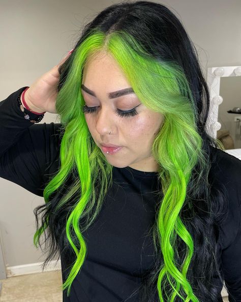 Neon green hair is a vibrant style that can instantly elevate your look. The bright green hue works well with various colors like purple, blonde, and brown. Click the article link for more photos and inspiration like this // Photo Credit: Instagram @hair_byyadira // #blackandneongreenhair #greenhair #halfblackhalfneongreenhair #neongreenhair #neongreenhaircolor #ombreneongreenhair #shortneongreenhair Lime Green Money Piece Hair, Black Hair Green Money Piece, Neon Green Money Piece Hair, Blond And Green Hair, Like Green Hair, Green Halo Hair, Neon Green Hair Streaks, Black Hair Green Highlights, Black And Neon Green Hair