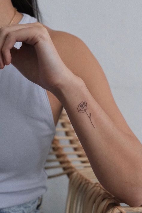 Explore our collection of over 70 single line tattoos, perfect for those seeking minimalist elegance. From subtle to bold, these one-line designs inspire a sleek, understated aesthetic. Skellington Tattoo, Minimalist Symbols, Rose Tattoo On Arm, Small Tattoos For Women, Rose Tattoos For Women, Small Rose Tattoo, Single Line Tattoo, Flower Wrist Tattoos, Tattoo Wrist