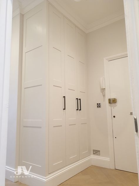 A hallway fitted wardrobe is a great solution to create more storage for your coats, jackets and shoes.   The hallway cupboard on this example is also hiding electrical meter and fuse box behind the doors. Landing Storage, Coat Cupboard, Hallway Storage Cabinet, Hallway Cupboards, Shoe Storage Cupboard, Hall Cupboard, Fitted Wardrobe, Hallway Cabinet, Shoe Cupboard