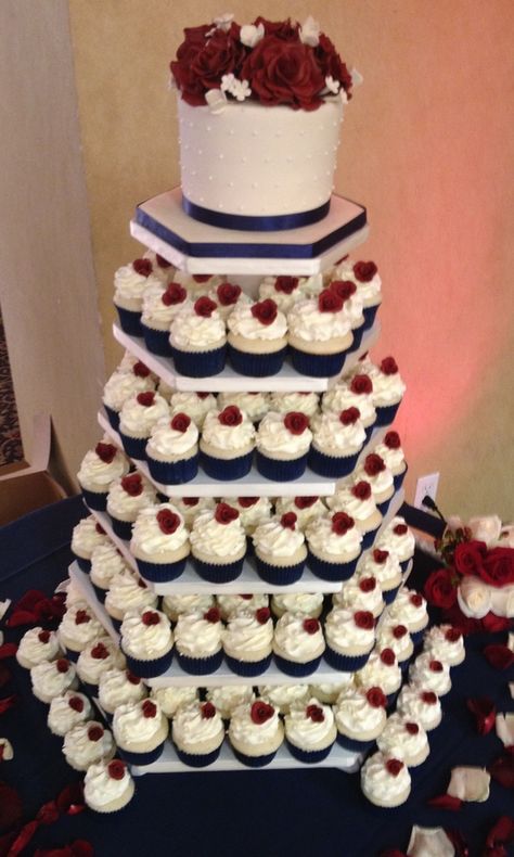 burgundy wedding | Navy Blue, Burgundy & Ivory cupcake tower — Mini Cakes / Petit Fours Navy And Red Wedding Decor, Navy Cakes, Navy Blue Wedding Cakes, Cranberry Wedding, Navy And Burgundy Wedding, Wedding Cake Navy, Burgundy Wedding Cake, Flowers Stand, Burgundy Roses