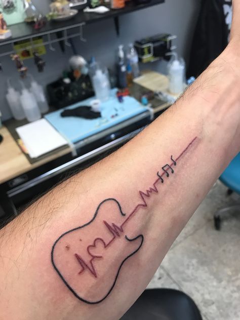 Guitar heartbeat tattoo Guitar Heartbeat Tattoo, Red Guitar Tattoo, Electric Guitar Tattoo For Men, Guitar Tatoos Small, Tattoo Ideas Guitar, Electric Guitar Tattoo, Tattoos For Music Lovers, Music Guitar Tattoo, Guitar Tattoo Ideas