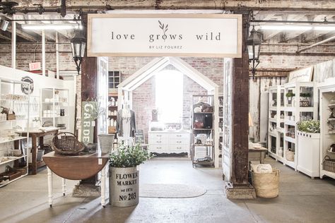 Home and lifestyle blogger Liz Fourez takes you on a tour of her retail shop in Indiana with her favorite home decor pieces and the unique displays she built to create a destination to shop in. Country Boutique Decor, Owning A Retail Store, Retail Accent Wall, Home Decor Retail Store, Farmhouse Retail Store, Industrial Retail Design, Liz Fourez, Wood Pillars, Antique French Doors