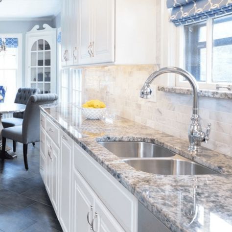 Top 11 Backsplash Ideas for White Cabinets and Granite Countertops | Granite With Tile Backsplash, Kitchen Backsplash With White Cabinets And Brown Granite Countertops, Backsplash For Busy Granite Countertops, Blue Dunes Granite With Backsplash, White Kitchen Cabinets With Dark Granite, Backsplash With Busy Granite, Kitchen Countertops And Backsplash Ideas, Backsplash Ideas With Granite Countertop, Backsplash With Granite Countertops