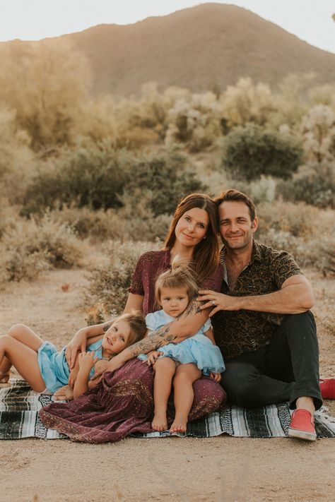 Desert family photos Desert Family Portraits, Fall Desert Photoshoot Family, Family Pictures Sitting On Blanket, Family Photos In The Desert, Desert Photoshoot Ideas Family, Desert Christmas Photo Shoot, Desert Family Photos Outfits, Family Desert Photoshoot, Desert Family Pictures