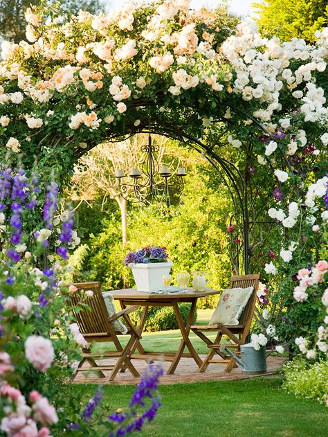 A romantic rose-covered arbor makes this elegant patio a show-stopper. Find more beautiful arbors: http://www.bhg.com/gardening/landscaping-projects/landscape-basics/arbors-and-trellises-in-the-landscape/?socsrc=bhgpin071012#page=2 Diy Arbour, Rose Arbor, Desain Lanskap, Garden Arbor, Secret Gardens, Have Inspiration, The Secret Garden, Romantic Garden, Garden Gate