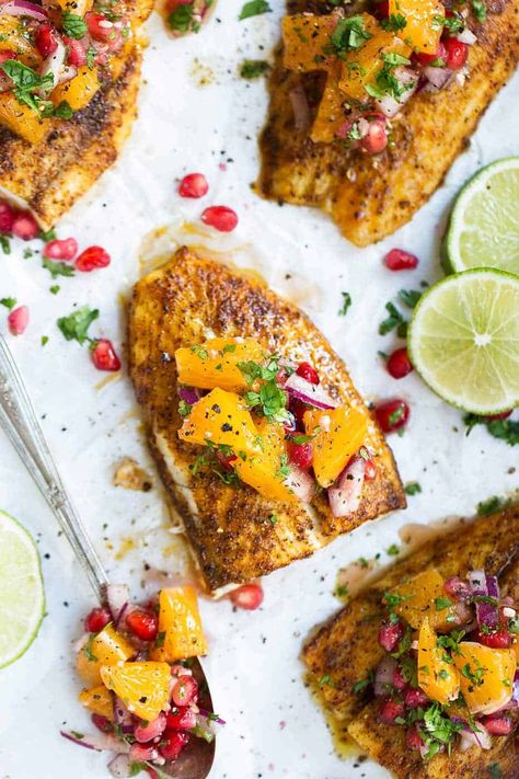 Broiled barramundi with citrus salsa is the perfect refreshing lunch or dinner recipe! The fish cooks in under 10 minutes and the salsa is so light and fresh, made up of fresh oranges, pomegranate seeds, lime juice and herbs | Paleo barramundi with citrus salsa | whole30 broiled barramundi | The Movement Menu || #paleodinner #fishrecipe Barramundi Fish Recipes, Easy Paleo Lunch, Easy Paleo Lunches, Barramundi Fish, Citrus Salsa, Paleo Fish Tacos, Barramundi Recipes, Low Carb Tuna Salad, Paleo Recipes Lunch