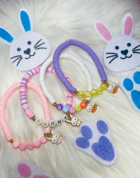 When you order one Easter bracelet, you get one super cute seed, bead, Easter bracelet for free ❤️ Super cute Easter name bracelets:)  This listing consist of four different types of bracelets. You can choose from pink, white, purple or mix. You also can choose the color letters you would like. White and gold, pink and white, yellow or mix . Please allow 1-3  days processing time when you purchase, as each piece is made especially for you! Each bracelet is handmade color shape and size so it may slightly  vary from photos.Each bracelet is made with strong durable stretch cord.effort has been put into finding high quality strong material  These also make the perfect gifts for mom, grandmas, sisters, brides ,bridesmaids, girls, baby showers ,birthday gifts , teachers the list is endless.  If Different Types Of Bracelets, Types Of Bracelets, Bracelets Name, Heishi Bracelets, Name Bracelets, Easter Basket Stuffers, Easter Jewelry, Easter Basket Fillers, Basket Fillers