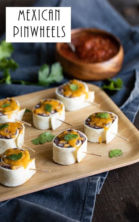 Mexican Pinwheels. These Mexican Roll Ups with Black Beans and Cheese are a super easy, vegetarian appetizer. It's also the perfect, Cold Mexican Appetizer - great for warm days when no bake recipes are the only option! #mexican #appetizers #coldappetizers #cincodemayo #appetizers #appetizer #lmrecipes Cold Mexican Appetizers, Mexican Pinwheels Appetizers, Tortilla Rollup, Easy Vegetarian Appetizers, Mexican Roll Ups, Mexican Pinwheels, Mexican Lunch, Mexican Appetizer, Salsa Lessons