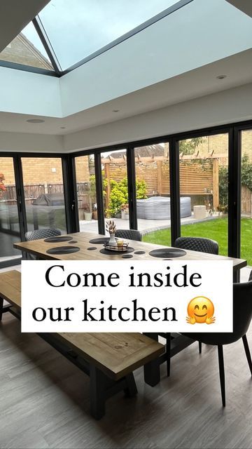 Emily | Project Ivel 🏡 on Instagram: "Come inside my bifolds with me 🤗 We love our open plan kitchen and find it’s the perfect space to hang out with our family and friends. I get messages asking why is my living room so small but actually we do have a separate living room. I’m actually more than grateful for the space we do have! 🥰 Our new rug goes perfectly and replaces the shaggy one which got so much stuck inside it 🙈 @therugseller Ad #gardensofinstagram #gardeninspiration #ukgarde Dining Room Extension Off Kitchen, Kitchen Dining Snug Open Plan, Long Kitchen Diner Ideas, Kitchen Extension Ideas Open Plan, L Shaped Kitchen Diner Family Room, Separate Living Room And Kitchen, Living Room Extension Ideas, Small Kitchen Extension, Kitchen Living Area Open Plan