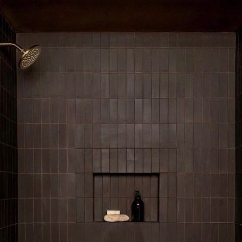 Studio Robert McKinley on Instagram: "Tone on tone on tone - from tile, grout, to ceiling. We created this bathroom in a pool room. We love the idea of exiting the sun drenched backyard and entering into a cool dark space to shower and refresh after a day in the sun. . Tile: @heathceramics Tub: @duravit Faucets: @calfaucets photo: @selliottphoto" Dark Mosaic Tile Bathroom, Dark Wc Ideas, Moody Tile Bathroom, Dark Wet Room, Dark Tiled Shower Ideas, Dark Brown Shower Tile, Black Square Tile Bathroom, Bathroom Tile Dark Grout, Tiled Bathroom Ceiling