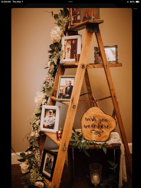 Ladder Decor Wedding Receptions, Picture Board Wedding Receptions, Wedding Ladder Ideas, Remembrance Ladder Wedding, Picture Ladder Wedding, Wedding Photo Display At Reception Family Pictures, Ladder Picture Display Wedding, Wedding Ladder Display, Rustic Memorial Table At Wedding