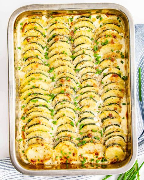 This Zucchini Potato Bake is chock full of goodness - it's creamy and delicious with just the right amount of cheese and spices, giving it lots of flavour! #zucchini #potato #bake #sides #recipe Tender Baked Chicken Breast, Zucchini In The Oven, Zucchini Recipes Baked, Onion Casserole, Zucchini Side Dishes, A Couple Cooks, Chocolate Zucchini Bread, Baked Squash, Baked Zucchini