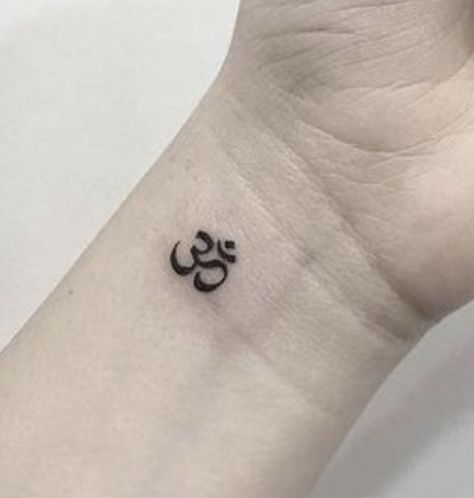 Om Wrist Tattoo, Girl Shoulder Tattoos, Peace Tattoos, Om Tattoo Design, Cross Tattoos For Women, Om Tattoo, Neck Tattoos Women, Back Of Neck Tattoo, Wrist Tattoos For Guys