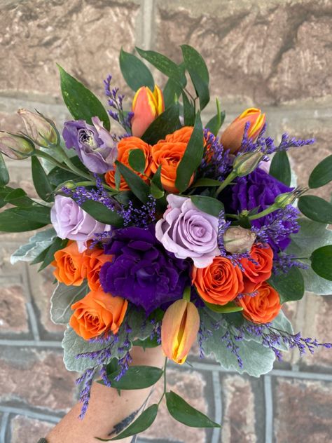 Orange And Purple Fall Wedding Bouquet, Purple Orange Green Bouquet, Flowers For Purple Prom Dress, Purple And Orange Corsage, Flowers For Orange Prom Dress, Purple Blue And Orange Wedding, Purple Orange Flower Arrangement, Orange Prom Flowers Bouquets, Purple Green And Orange Wedding