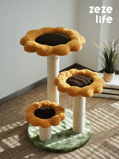 This vibrant orange cat tree blooms with sunflower accents, offering pets soft perches, durable scratching posts, dangling toys and stepped platforms to play, climb, and relax within a decoratively elegant indoor oasis. Colorful Cat Tree, Cats Tree Diy, Cat Toy Ideas, Cat Toys Aesthetic, Mushroom Cat Tree, Cute Cat Tree, Scratching Post For Cats, Diy Cat Scratching Post, Cute Cat Stuff