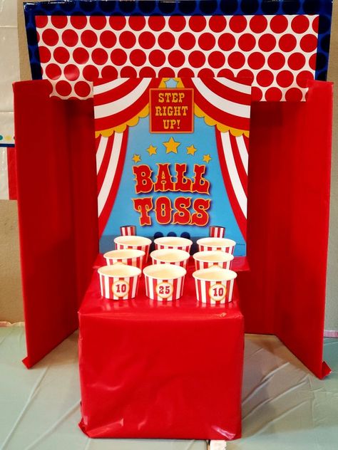 Carnival Food Display, Carnival Ball Toss Game, Diy Carnival Games For School, Spring Carnival Decorations, Daycare Carnival Ideas, Prize Table Display, School Fun Fair Ideas, Ball Toss Carnival Game, Carnival Theme Games