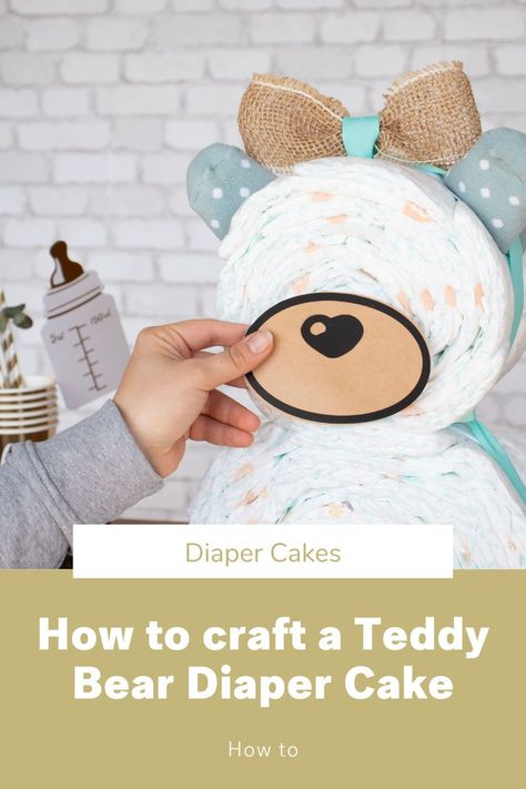 The cute bear diaper cake is a variation of the well-known nappy cake gift. It’s easy to make yourself and can be customised with lots of nice little baby gifts.It takes about 45 minutes to make this cute teddy bear. Of course, this depends on how well prepared you are and whether you have and extra pair of helping hands. It’s easier to make with help, but still possible to make it alone. If you have everything you need handy, then you can put this together in no time. Cute Diaper Gift Ideas, Teddy Bear Diaper Cake Tutorial, Diy Nappy Cake, How To Diaper Cake, Baby Boy Diaper Cake Ideas Diy, Teddy Bear Baby Shower Food Ideas, How To Make Diaper Cake, Bear Diaper Cakes For Baby Boy, Nappy Cake Ideas Diy