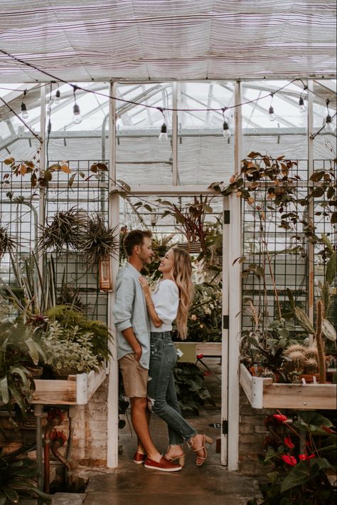 Greenhouse photo shoot Green House Photography, Green House Picture Ideas, Family Photos In Greenhouse, Greenhouse Pictures Family, Plant Shop Engagement Photos, Greenhouse Photoshoot Outfit, Maternity Photos Greenhouse, Plant Nursery Photoshoot Couple, Photoshoot In Greenhouse