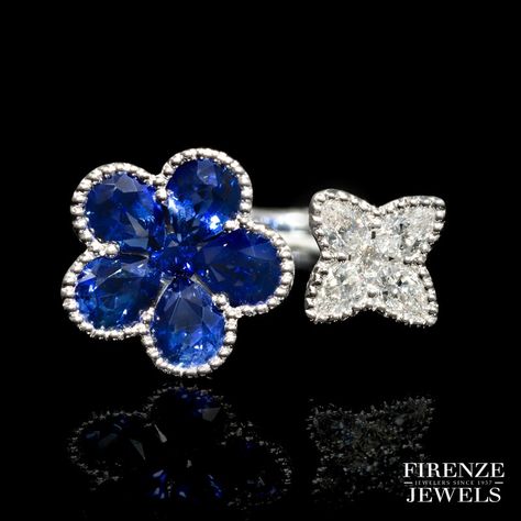 Fun and floral rings are one of our favorite things to design!  This 18k white gold ring comes complete with 1.73 cts of pear shaped blue sapphire and .33 ct of pear shaped and round brilliant cut white diamonds. Available @ http://bit.ly/Firenze8316  #FirenzeJewels #DiamondRing #SapphireRing Jewelry Set Design, I Love Jewelry, Sapphire Stone, Sapphire Jewelry, White Gold Ring, Dream Jewelry, White Diamonds, Set Design, White Gold Rings