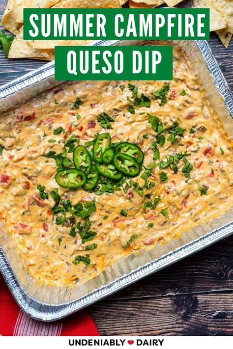 This summer, bring next-level dining to your campsite with this Grilled Campfire Queso Dip! This campfire queso recipe is for all the outdoorsy grillers and everyone lucky enough to hang with them. Campfire Queso Recipe, Dip For Camping, Camp Fire Queso, Campfire Food Ideas Outdoor Cooking, Camping Cheese Dip, Campfire Recipes Foil, Camping Party Appetizers, Campfire Cheese Dip, Camping Queso