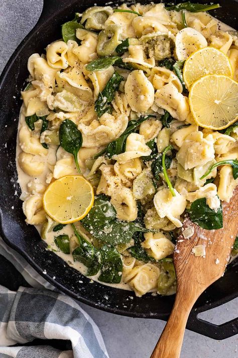 Overhead view of creamy lemon tortellini in a skillet with wood spatula to the side. Lemon Tortellini, Lemon Parmesan Sauce, Recipes Using Ground Beef, Wood Spatula, Lemon Cheese, Tortellini Recipes, Homemade Ravioli, Parmesan Sauce, Homemade Hamburgers