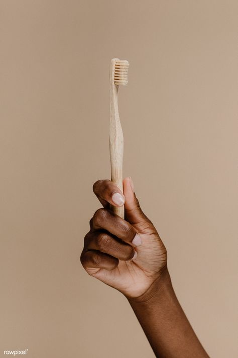 Black hand holding a wooden toothbrush | premium image by rawpixel.com / McKinsey Wooden Toothbrush, Dentist Logo, Sikat Gigi, Dental Art, How To Prevent Cavities, Bamboo Toothbrush, Hand Holding, Black Hand, Oral Hygiene