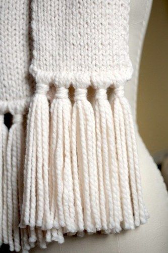 Add Tassels To Blanket, Knitted Blanket Scarf, Add Tassels To Scarf, How To Make Tassels With Yarn For Scarf, Tassles On Crochet Scarf, How To Make Tassels For Crochet Blanket, Blanket Tassels Diy, Adding Tassels To Scarf, How To Make Fringe On A Scarf