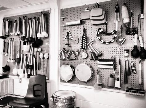 Auxiliary percussion storage pegboard Percussion Storage Ideas, Pegboard Music Studio, Music Studio Storage Ideas, Music Studio Storage, Storage Pegboard, Music Room Storage, Music Room Organization, Drum Storage, Office Music